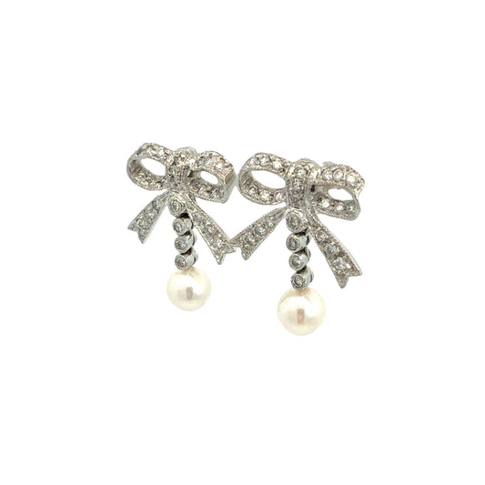 14k White Gold 0.60cttw Diamond Bow and Pearl Drop Earrings1